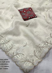 Ivory white crush saree.