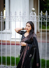 Black ajrakh handwork saree.