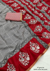 Grey/red ajrakh style saree.