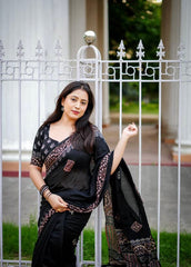 Black ajrakh handwork saree.
