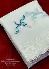 Vanila white crush saree.