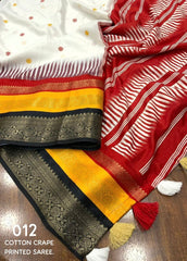 White dolla printed saree.