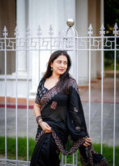 Black ajrakh handwork saree.