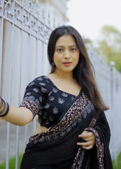 Black ajrakh handwork saree.