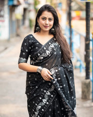 BLACK IKKAT STYLE WOVEN SAREE.