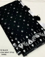 BLACK IKKAT STYLE WOVEN SAREE.