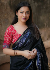 Hand block ajrakh saree.