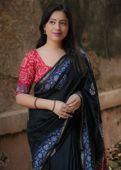 Hand block ajrakh saree.