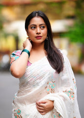 Paper crush white embroidery saree.