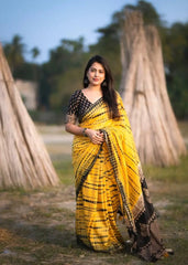 Yellow tye & dye shibori saree.