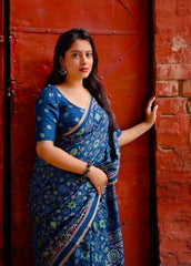 Teal blue ajrakh style saree.