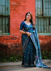 Teal blue ajrakh style saree.