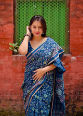 Teal blue ajrakh style saree.